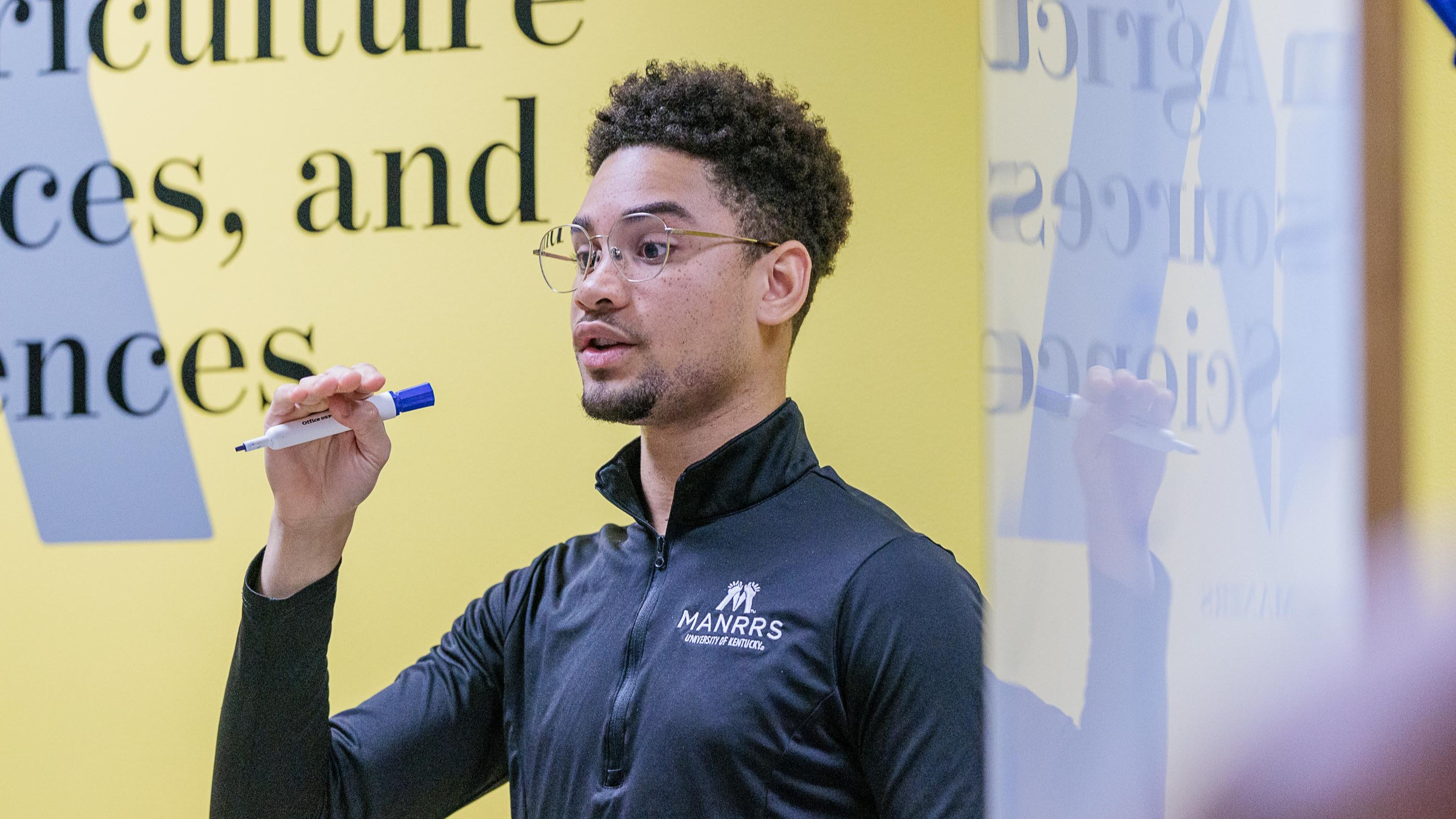 Harrison Goode leading a training in the UK MANRRS community room on campus. Photo by Matt Barton.