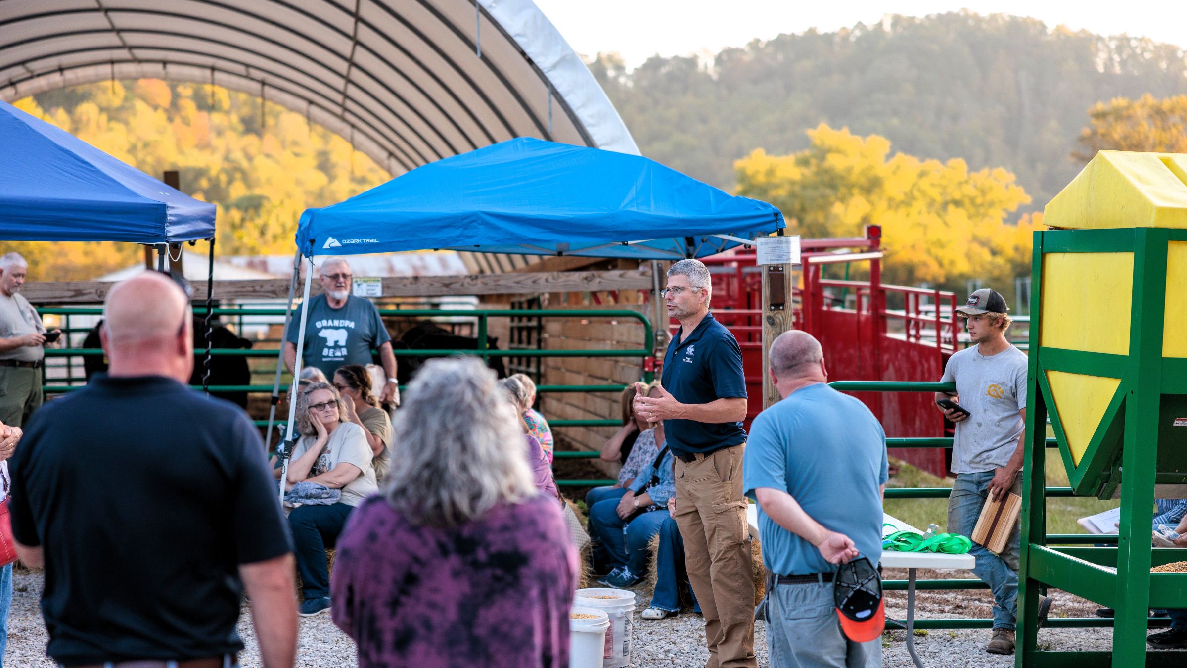 UK extension beef cattle specialist Jeff Lehmkuhler (pictured in the center) showing the new livestock facility barn. Photo by Matt Barton.