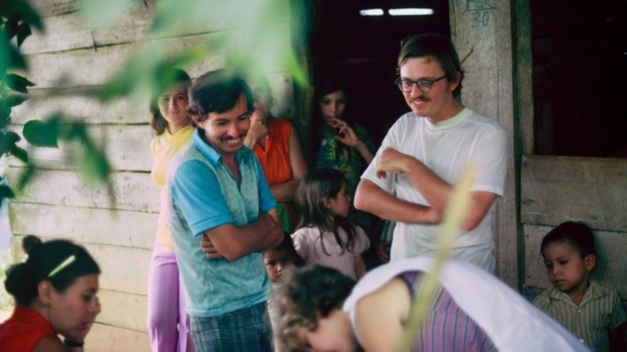 Ron Hustedde (pictured in white shirt) served with the Peace Corps in a mountain village in Costa Rica, vaccinating children in 1975. Photo provided by Ron Hustedde.